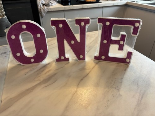 One pink led - one, letter